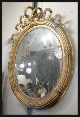 II.2306 ESPEJO OVALADO CON CORONACIÓN
