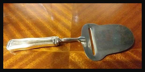 II.2354 REBANADOR DE QUESO DE PLATA