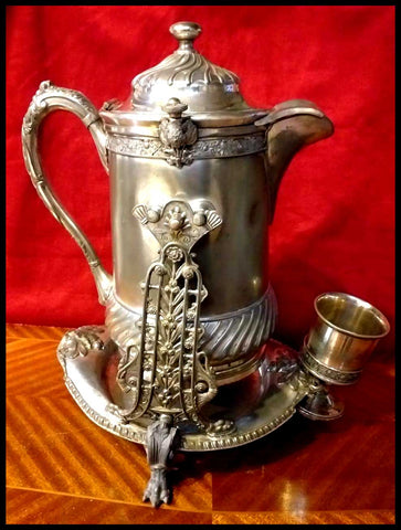 II.2566	CHOCOLATERA ANTIGUA CON CERÁMICA ADENTRO