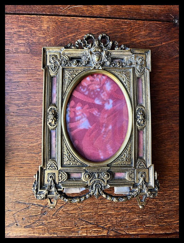 II.3440 PAR DE MARCOS DE BRONCE