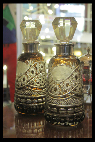 II.37 BOTELLAS DE CRISTAL COLOR ÁMBAR