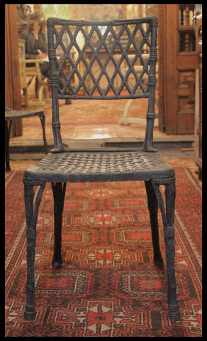 I.73 PAR DE SILLAS DE FIERRO FUNDIDO