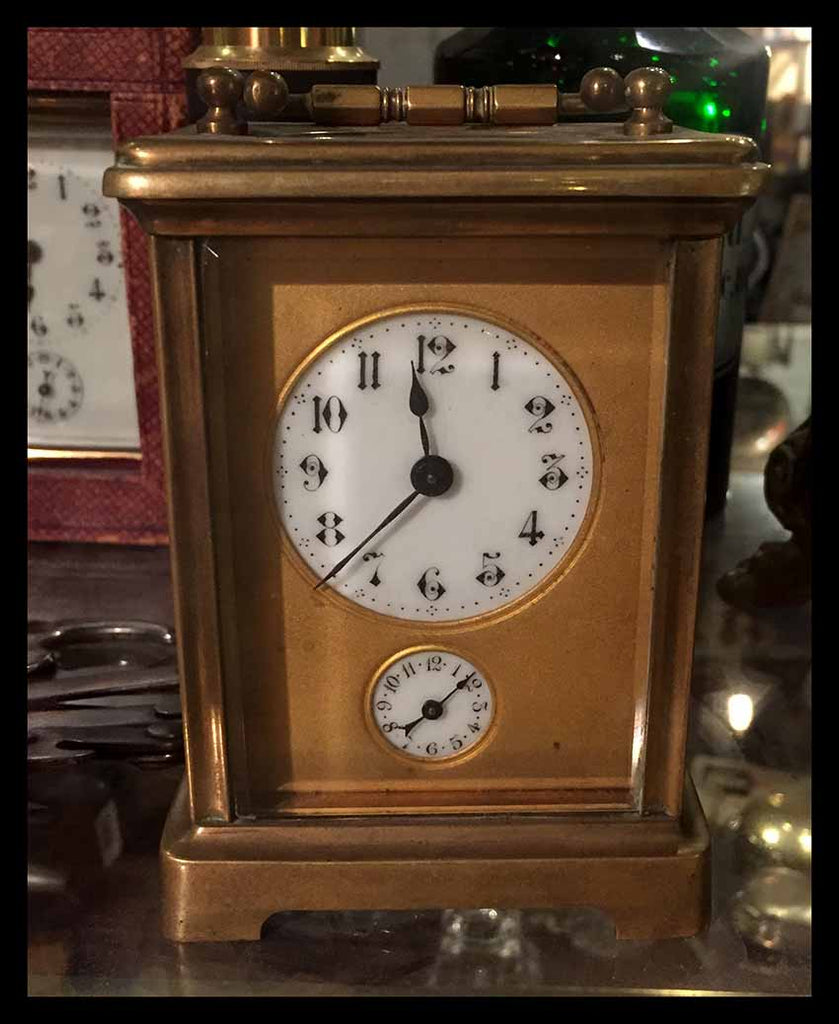 II.647 RELOJ DE VIAJE DE BRONCE