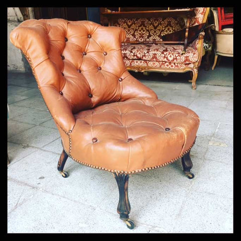 I.664 POLTRONA DE CUERO 1900